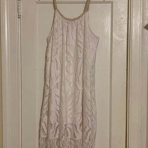 Versona white lace dress with fringe on it